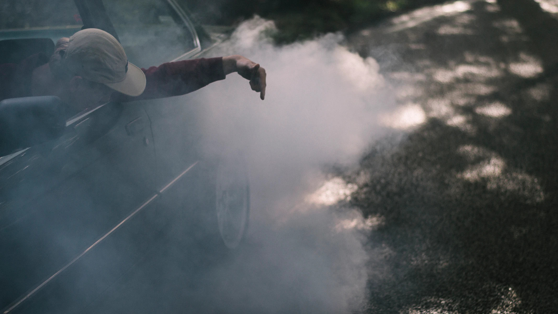 Photo of Koen creating a bunch of smoke with his BMW.