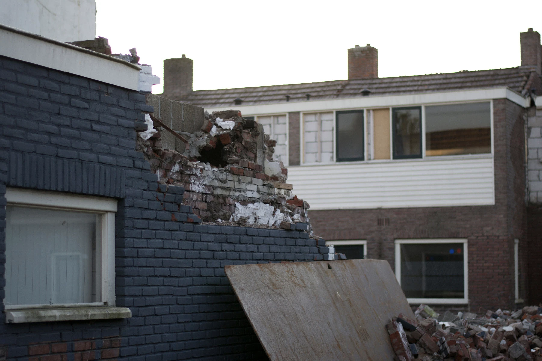 Photo of buildings that are being torn down.