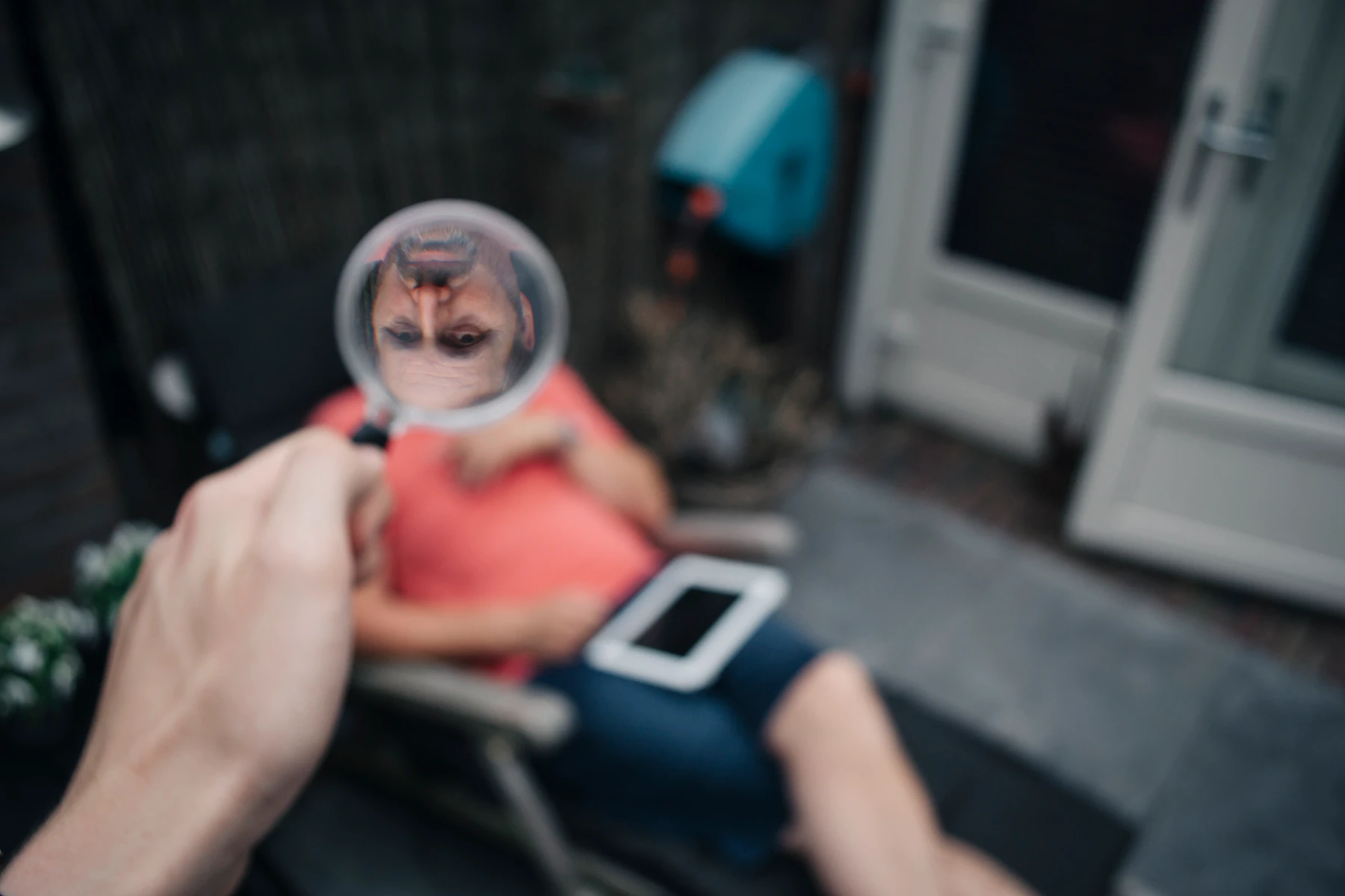 Photo of my dad but his face turned upside down by a magnifying glass.
